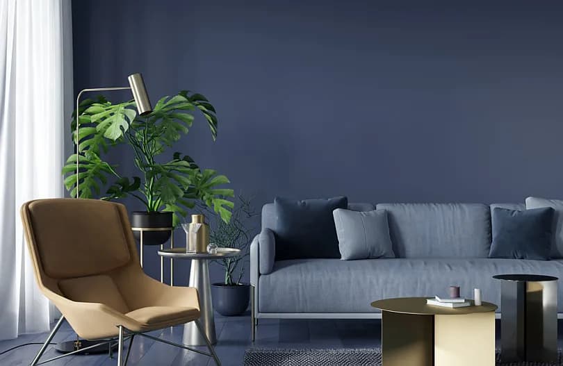 Czym łączyć granatową ścianę w salonie, aby uzyskać harmonię?